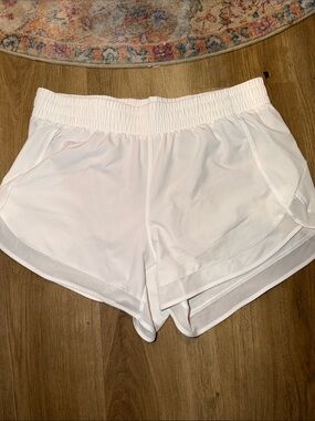 Athleta White Mesh Racer Run 4” Shorts | Size M
